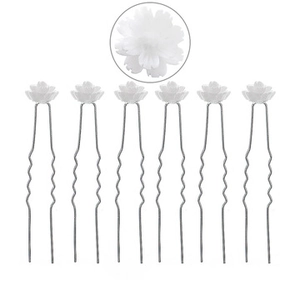 Detail view of 6-piece set of white resin flower U-shaped bridal hair pins with wavy metal grip