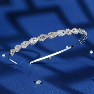 Exquisite hollow drop-shaped silver metal headband with sparkling white rhinestones
