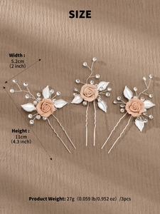Detail view of pink rose bridal hair combs with pearls and crystals for wedding styling