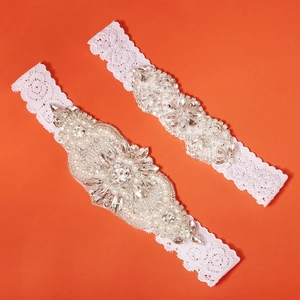 Set giarrettiera da sposa in pizzo bianco con perle fatte a mano e strass scintillanti eleganti