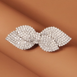 Detailed view of luxury bridal hair clip featuring full sparkling crystal rhinestones
