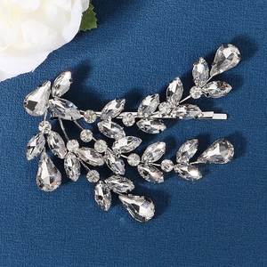 Silver leaf bridal hair clip featuring marquise rhinestones on a navy textured base