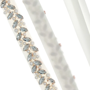 Elegant bridal wedding belt featuring marquise rhinestones and white pearls on ribbon
