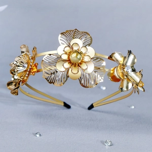 Elegant gold double-layered floral bridal headband with sparkling rhinestone accents