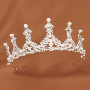Elegant silver alloy crown for girls featuring white pearls and sparkling clear rhinestones