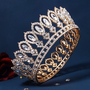 Golden baroque bridal crown with white crystals and rhinestones for wedding hair styles