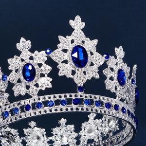 Detailed view of royal blue crystal crown with intricate snowflake diamond patterns