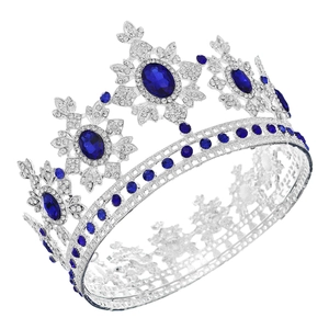 Vintage royal crown with blue sapphire stones and silver alloy base for bridal events