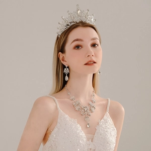 Exquisite bridal jewelry set including rhinestone crown necklace and earrings for wedding