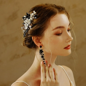 Elegant bridal hair comb and drop earrings set with black floral pearls and crystals