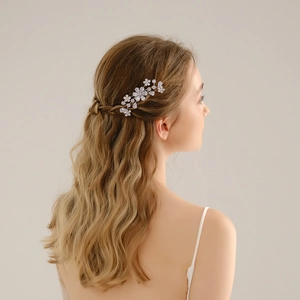 Elegant bridal sunflower hair comb with silver finish and sparkling cubic zirconia stones