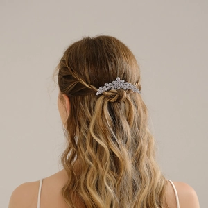 Elegant bridal hair comb with cubic zirconia flowers and leaf design in silver finish