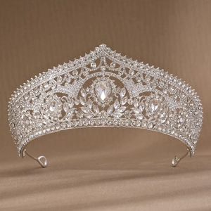 Luxurious bridal tiara crown with teardrop crystal centerpiece for weddings and parties