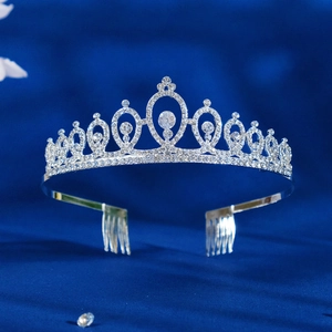 Silver bridal crown with clear rhinestones and side combs for wedding hairstyles