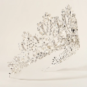 Detailed close-up of a silver baroque bridal crown with sparkling crystal rhinestones