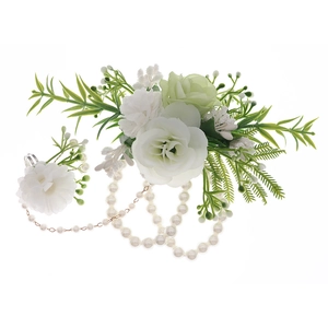 Elegant floral wrist corsage with white roses and pearls on a clean white background