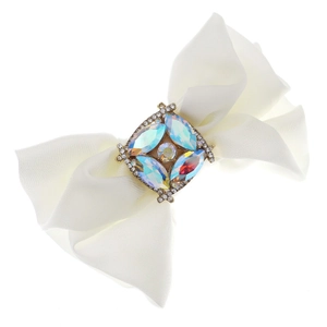 Elegant white satin bow hair clip with vintage crystal center ornament on white background