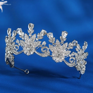 Elegant silver wedding tiara with sparkling crystal flowers and pear-shaped rhinestones