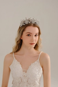 Front view of bridal tiara with sparkling rhinestones on a silver alloy metal frame
