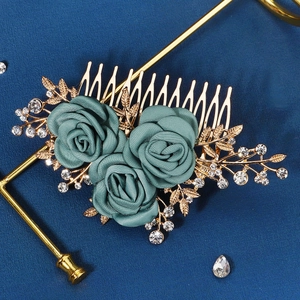 Exquisite emerald green fabric rose hair comb with golden metal leaves and rhinestones