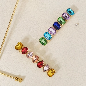 Rainbow rhinestone hair clips with gold metal base for elegant ponytail styling