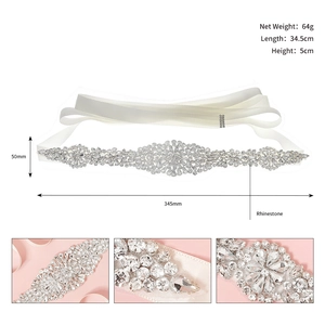 Detailed size view of bridal rhinestone belt with floral patterns and satin ribbon