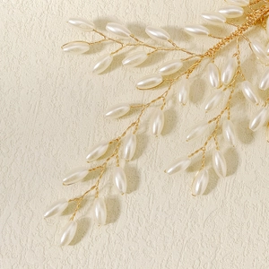 Elegant gold bridal hair comb with handmade pearls and twisted wire vine branches