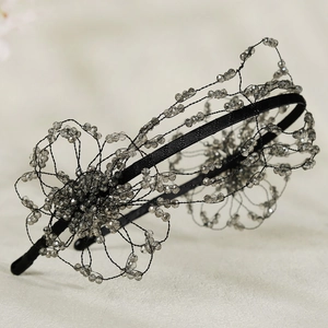 Detailed handmade headband with gray faceted crystal flowers and black satin band