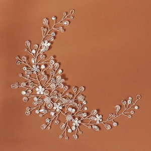 Close-up of handmade bridal headband featuring silver wire and clear crystal beads