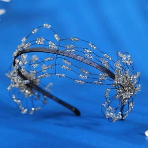 Handmade crystal crown headband with transparent beads on a black base for weddings