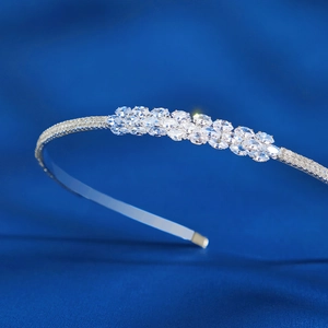 Macro view of silver bridal headband featuring sparkling marquise cut cubic zirconia stones