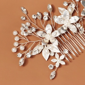Exquisite bridal hair comb with silver flowers, pearls and rhinestones for weddings