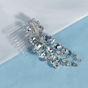 Detail of silver bridal hair comb with hand-wired marquise crystals and rhinestones