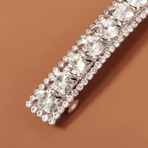 Detail shot of luxury rhinestone hair clip with brilliant-cut crystals and silver alloy base