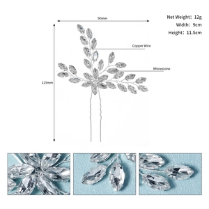 Vue détaillée d'une épingle à cheveux de mariée argentée avec strass et feuilles en cuivre