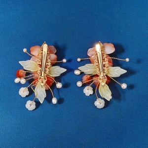 Chinese style bridal hair clips with resin flowers, pearls, and gold duckbill clips