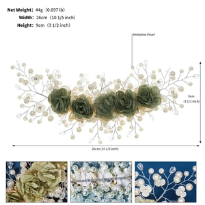 Detailed view of handmade green floral bridal hairpiece with size and weight metrics