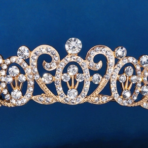 Golden baroque wedding crown with sparkling crystals in vintage court style for brides