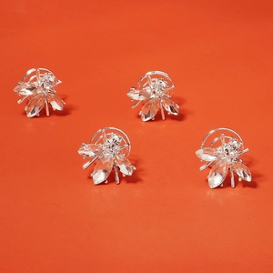 Lot de quatre épingles à cheveux argentées avec strass brillants en forme de fleur