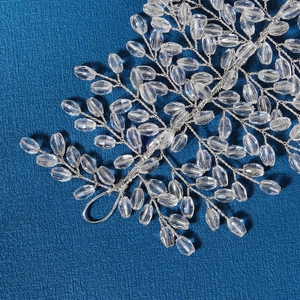 Exaggerated double-row crystal headband with silver wire branches for bridal stage wear
