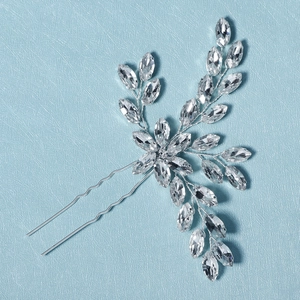 Elegant bridal hair pin with marquise rhinestones and silver leaves for wedding styling
