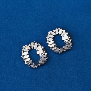 Detail of silver oval rhinestone buckles with marquee crystals for bridal wedding shoes