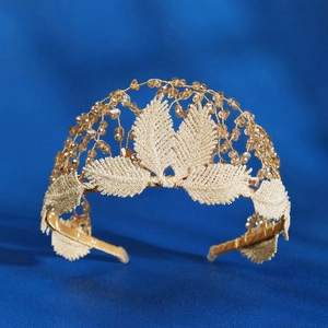 Golden bridal headband with champagne crystals and embroidered leaves for weddings