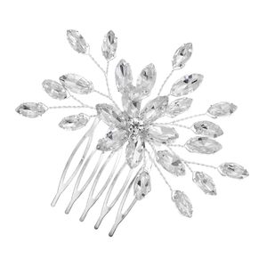 Close-up of silver floral hair comb with marquise rhinestones on a white background