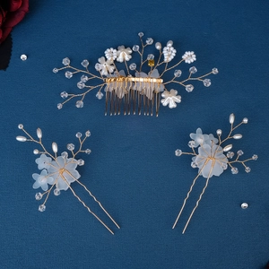 Elegant bridal hair comb and pin set with handmade pearls and gold floral leaves