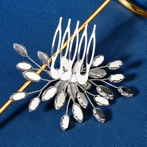 Exquisite bridal hair comb with marquise crystals and silver wire in a floral design