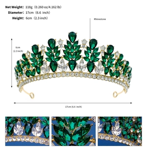 Detail showing emerald green crystal rhinestones on a gold bridal crown with dimensions