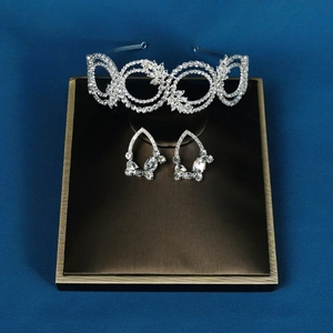 Silver bridal rhinestone headband and earring set with circular hollow crystal design
