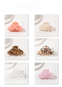 Detailed size specifications for 10.4cm bow-shaped hair claw clips in six varied colors