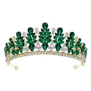 Luxurious gold bridal crown with deep green and clear crystals in a vintage symmetrical design